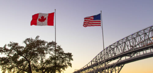 International Border Crossing. Sunset at the Blue Water Bridge border United States and Canada crossing. The bridge connects Port Huron, Michigan and Sarnia, Ontario.