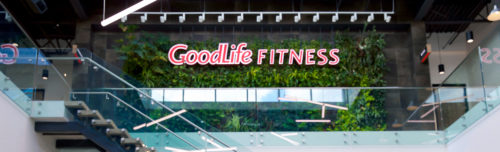 A gym with a sign that says goodlife fitness.